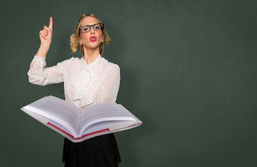 a lady holding a book | hoa documents